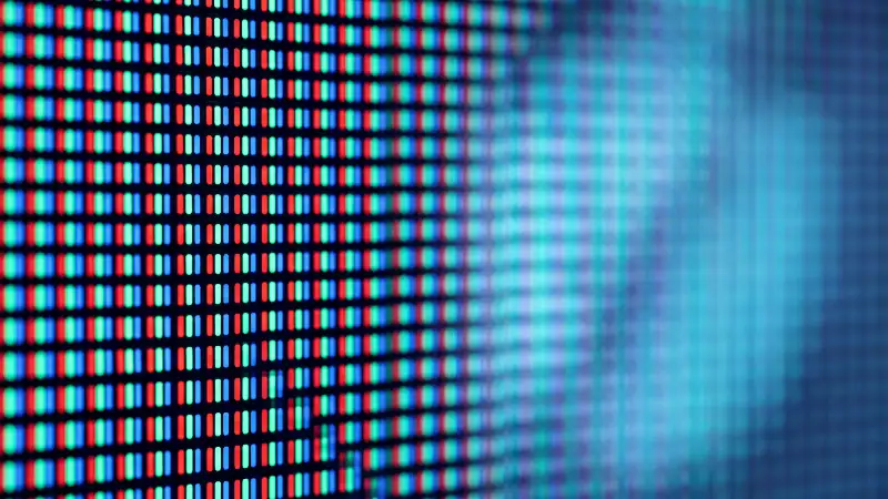 Macro d'une dalle OLED, sous-pixels nets à gauche et flous à droite